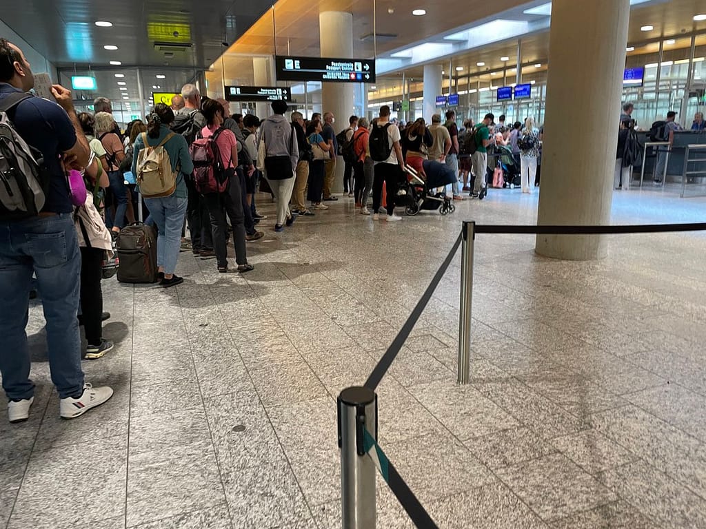 Crowded passport control at Zurich airport